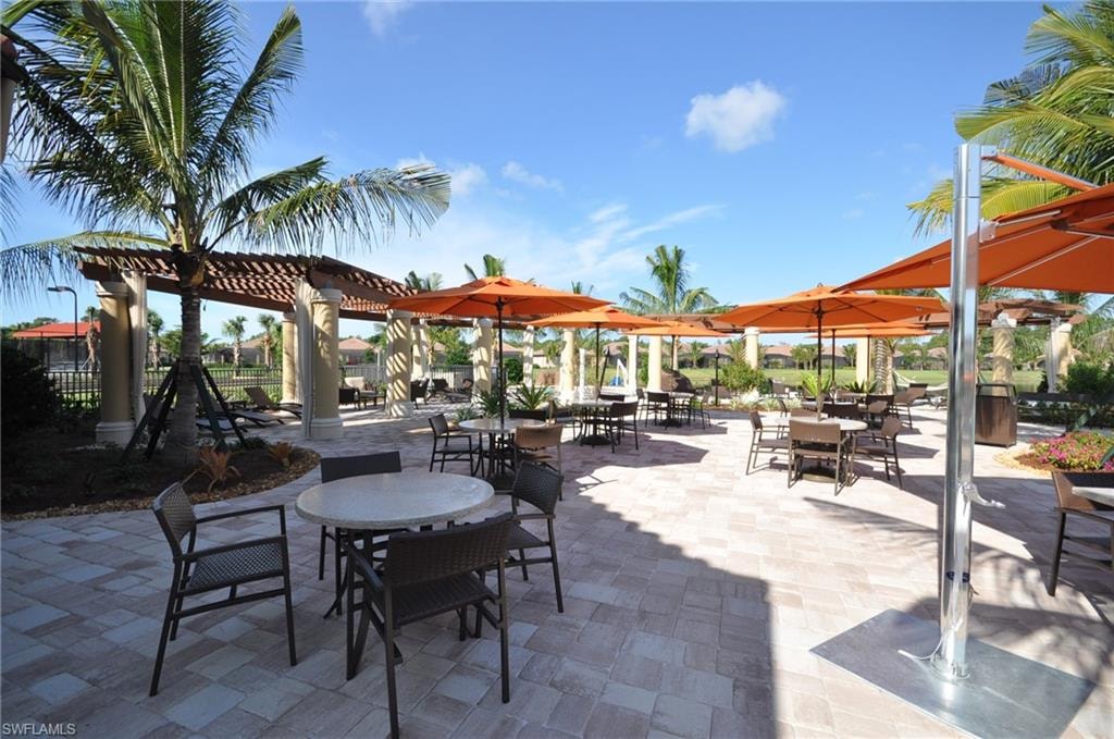 View of patio / terrace with a pergola and outdoor dining area