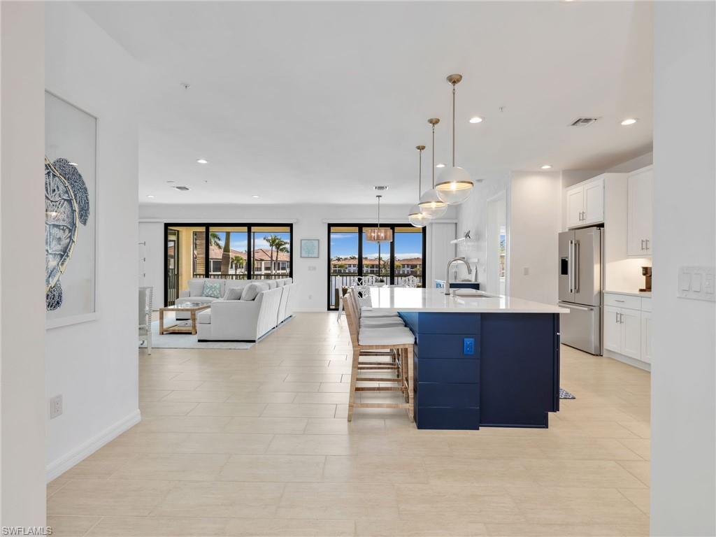 Open Floor Plan with Kitchen, Dining Area, and Great Room