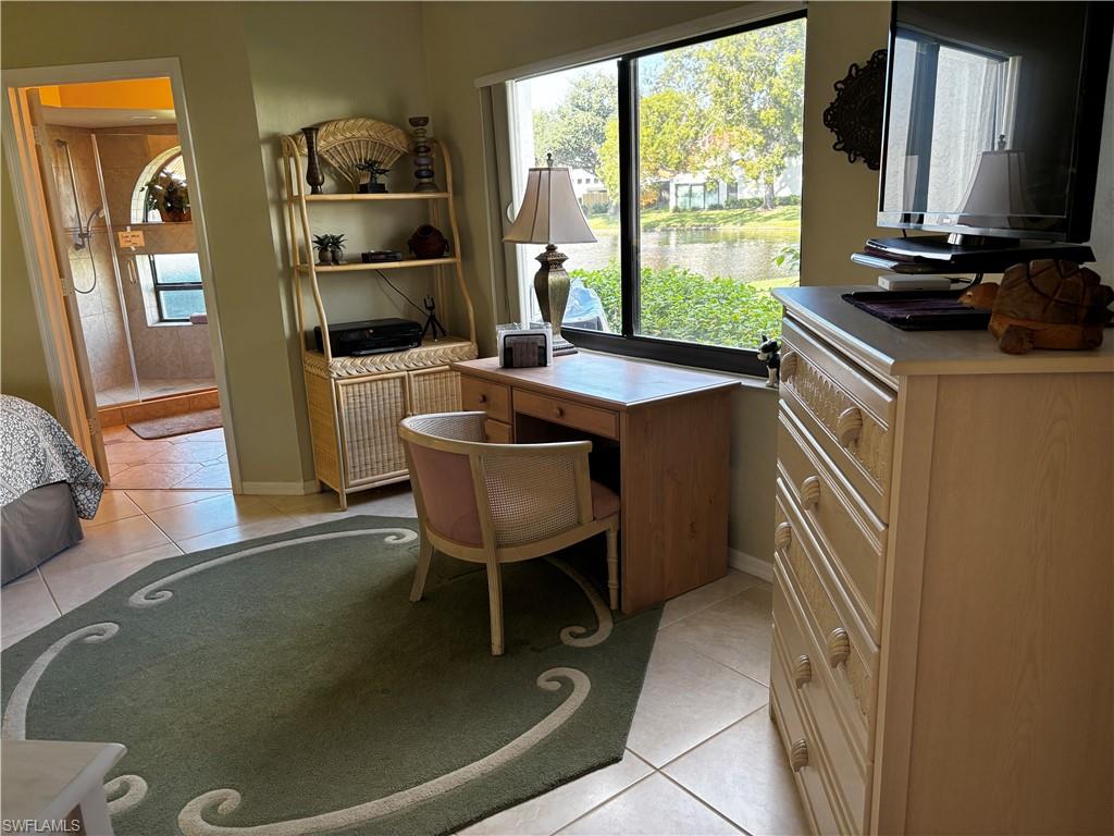 Office space featuring light tile patterned flooring