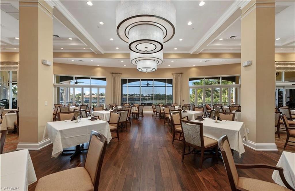 Dining space with dark wood finished floors, recessed lighting, beamed ceiling, and ornamental molding
