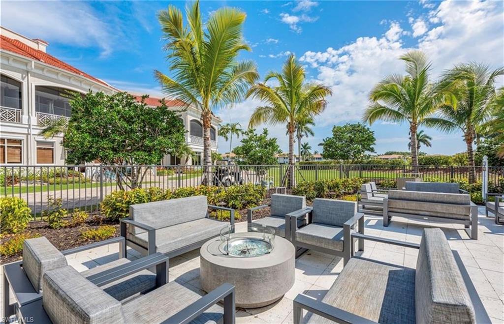 View of patio / terrace featuring an outdoor living space with a fire pit