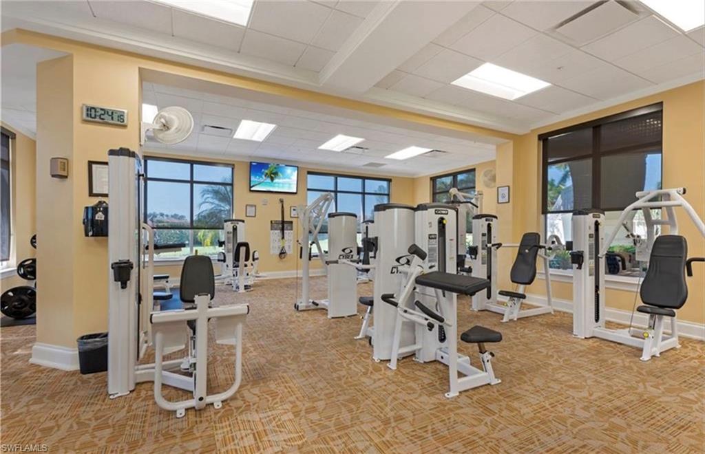 Exercise room featuring a drop ceiling
