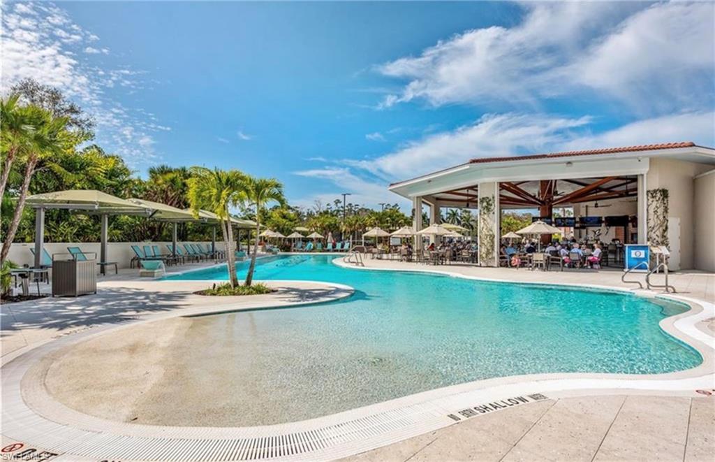 Community pool with a gazebo and a patio area