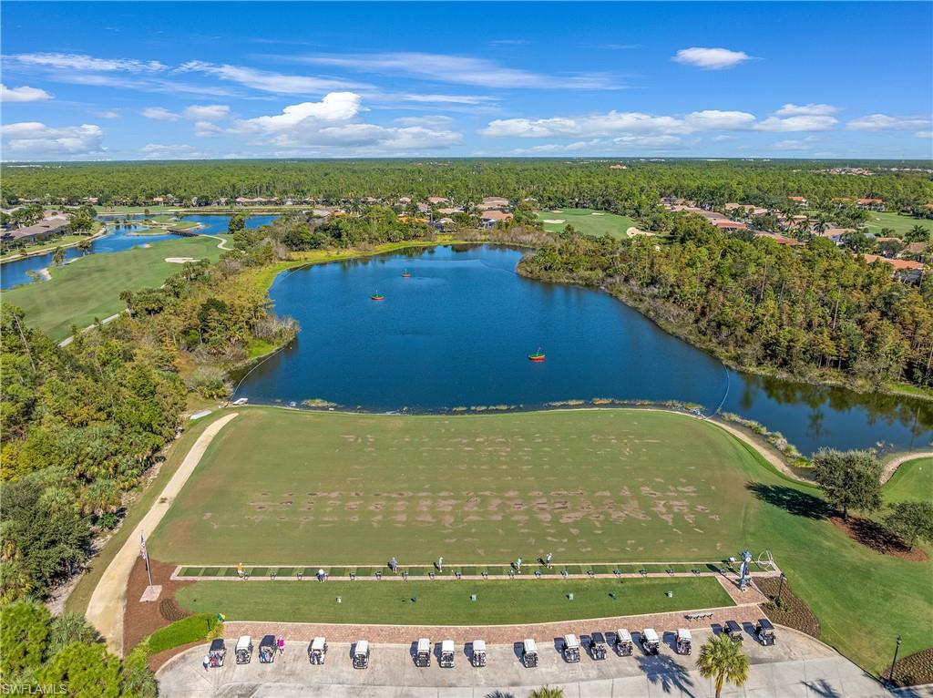 Bird's eye view of a nearby body of water and a golf course