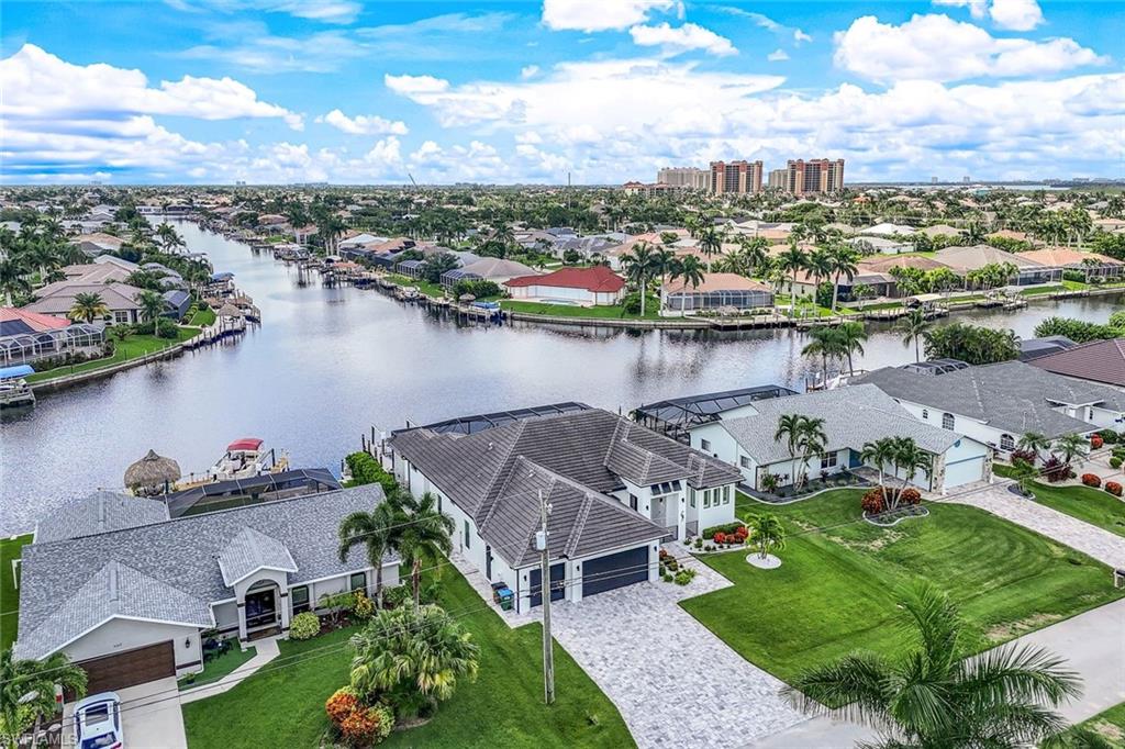 Aerial view of residential area with a nearby body of water