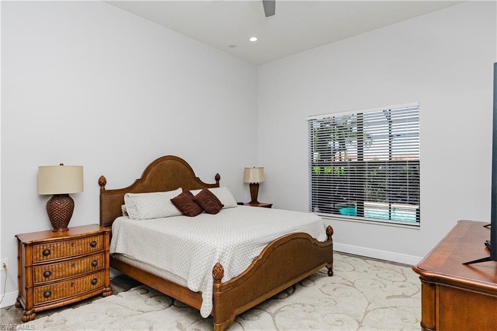 Bedroom featuring a ceiling fan and recessed lighting
