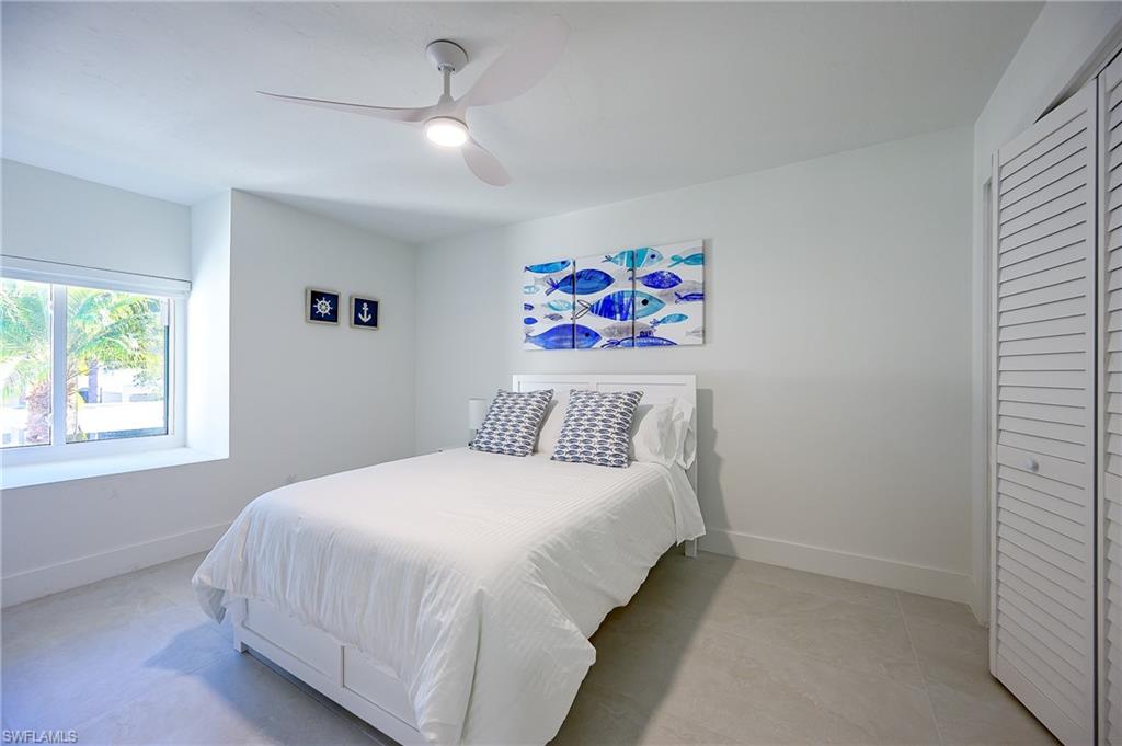3 Bedroom with a customized closet and a ceiling fan