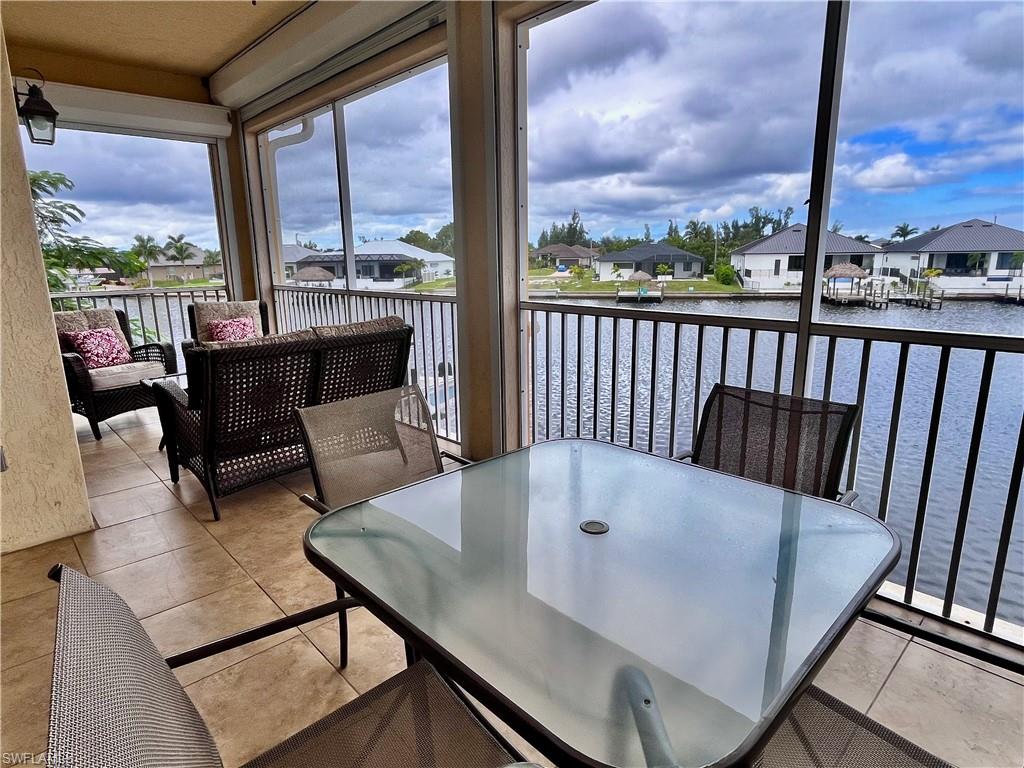Step out onto the screened-in balcony and take in peaceful waterfront views of the boardwalk and passing boats. It’s the perfect spot to enjoy the sunrise, have a cup of coffee, dine outdoors, sip cocktails, or simply relax as you watch boats come and go along the canal.