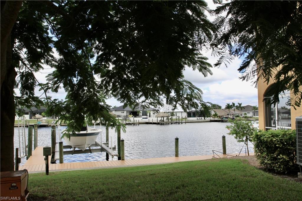 Backyard view from the unit out to the water and the boat docks.