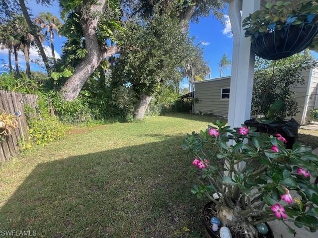View of fenced backyard