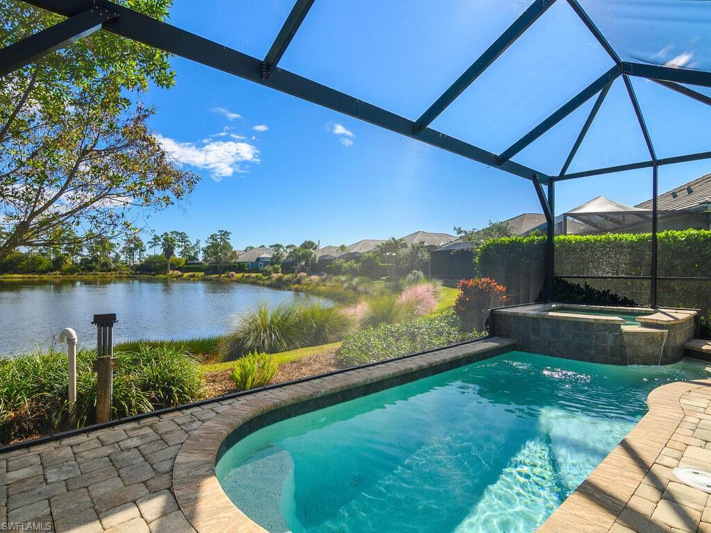 This shot shows you the upgraded panoramic screen and the lovely lake views beyond the pool and spa.