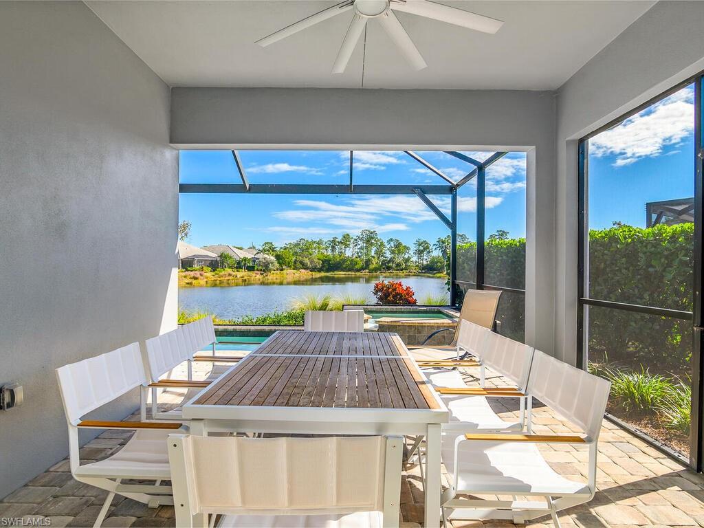 Screened Lanai with long water views, pool and spa.