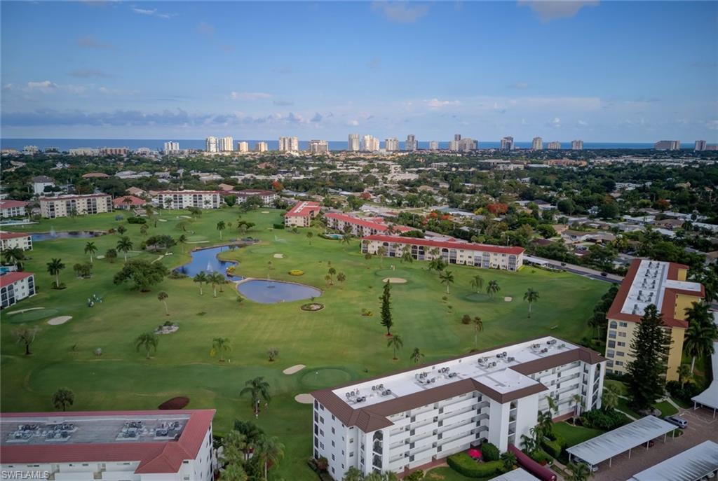 Drone / aerial view of a large body of water and city skyline
