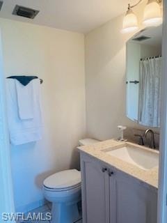 Full bath featuring vanity, curtained shower, and light tile patterned flooring