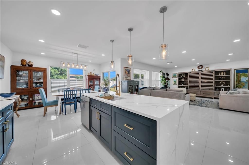 Dining space with recessed lighting, light tile patterned floors, and plenty of natural light