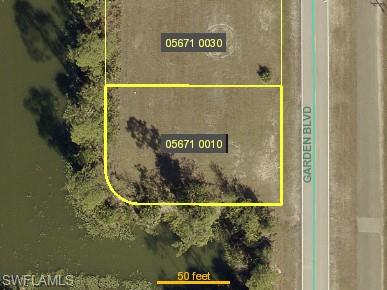 Aerial overview of property's location featuring property boundaries highlighted