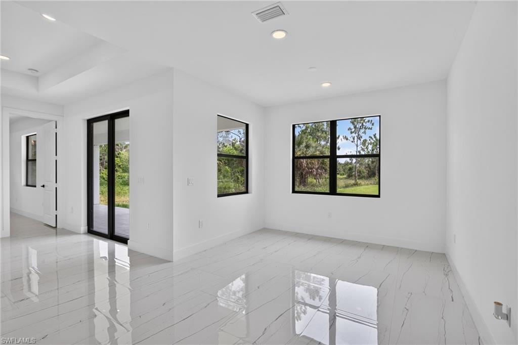 Dining Area with backyard and patio view