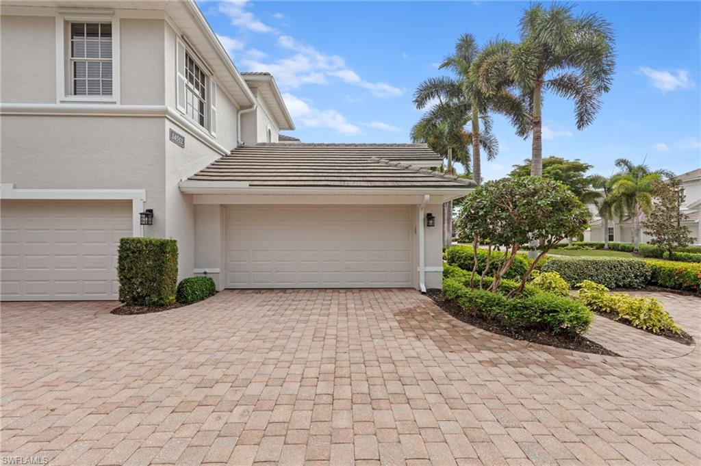 Garage with decorative driveway