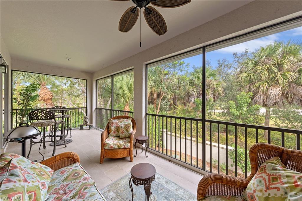 Sunroom / solarium featuring tile patterned flooring