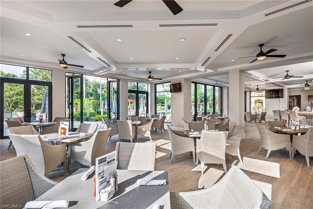 Dining space with coffered ceiling, beamed ceiling, a ceiling fan, wood finished floors, and recessed lighting