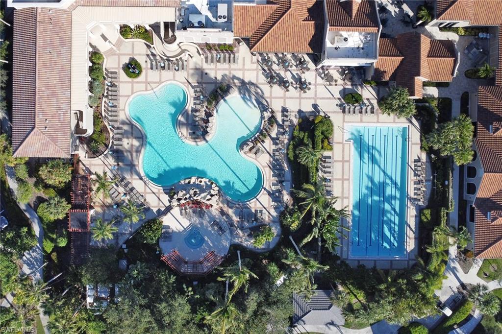 Aerial view of property's location featuring a pool area