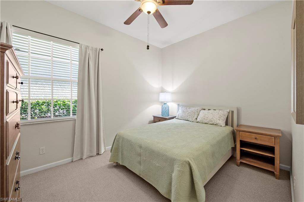 Bedroom featuring carpet flooring and a ceiling fan