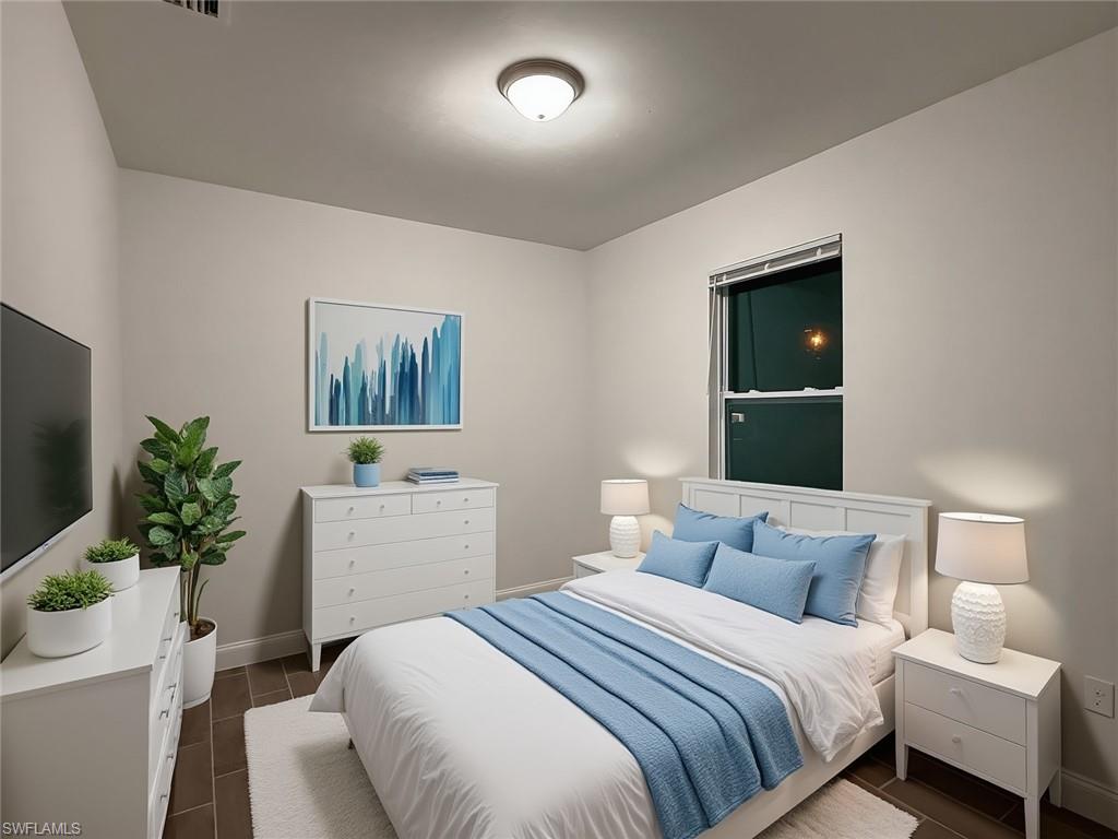 Bedroom featuring baseboards