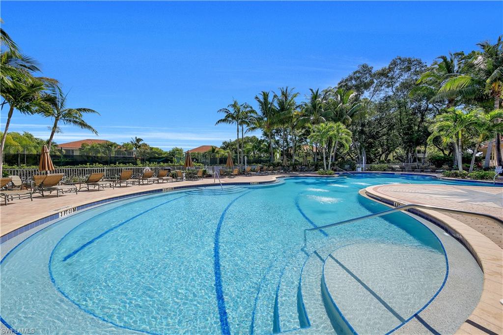 Community pool featuring a patio area