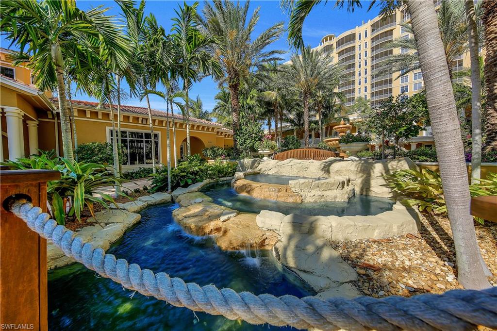 View of property's community with a garden pond