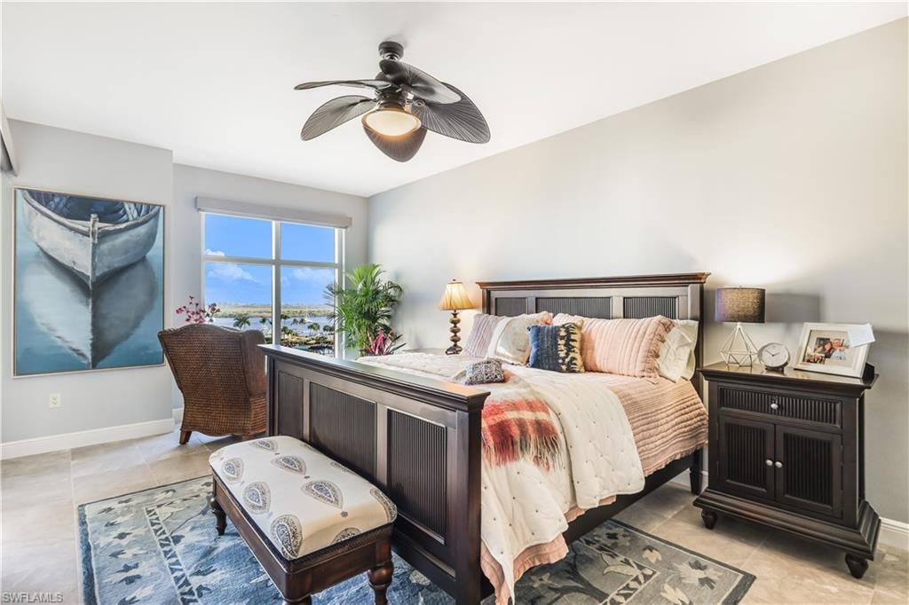 Bedroom featuring ceiling fan and light tile patterned floors