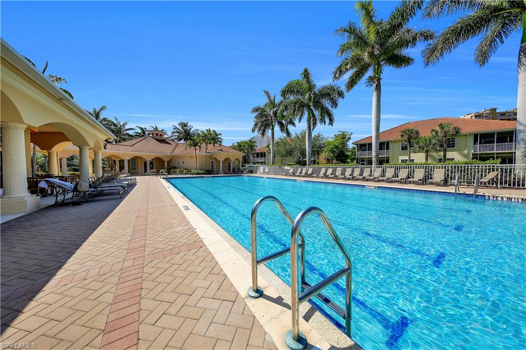 Community pool with a patio area
