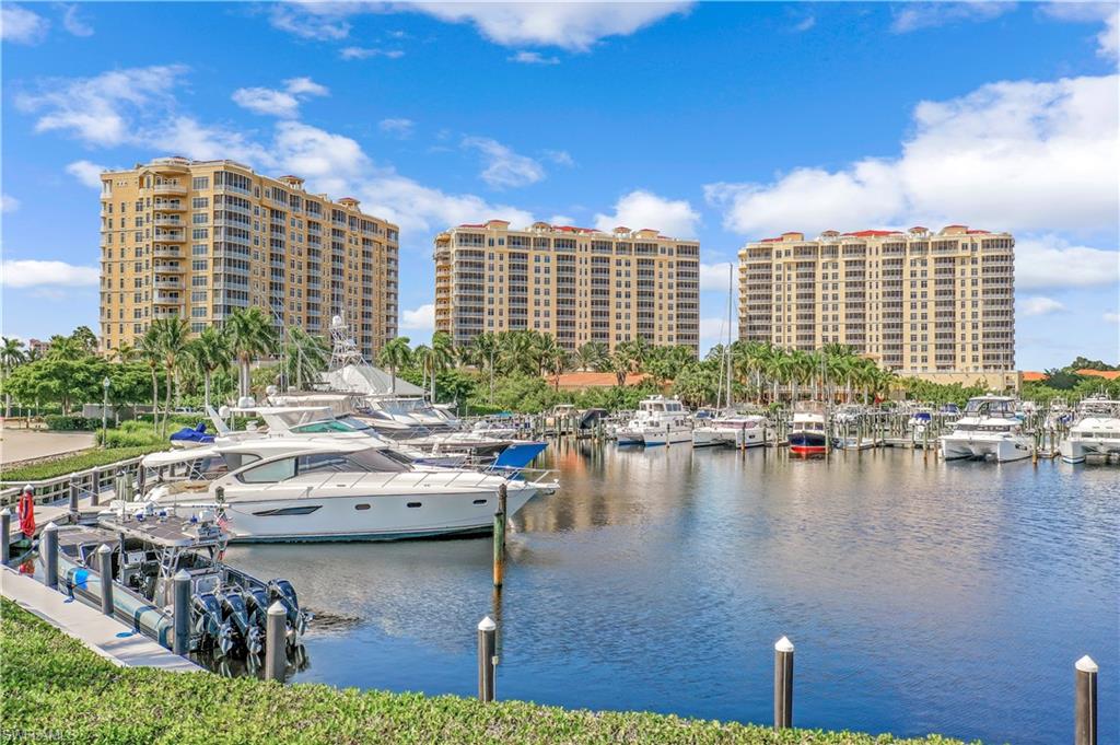 Dock featuring a water view and view of marina