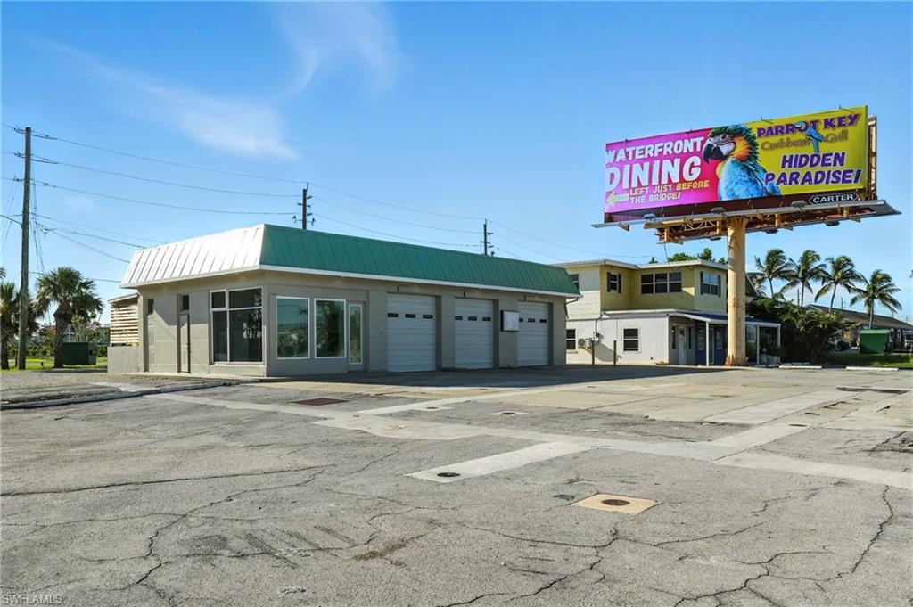Front corner view with huge parking lot!