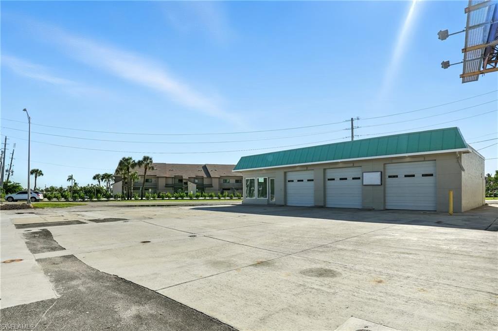Front view with huge parking lot!