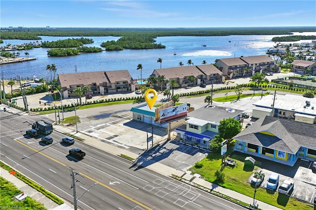 GREAT CORNER location at a signalized intersection — the busy gateway to Fort Myers Beach!