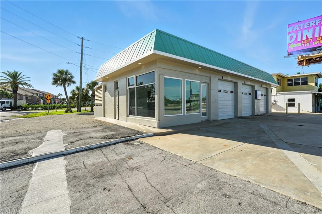 Front view with huge parking lot!