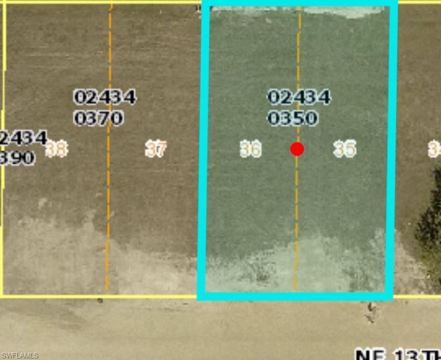 Aerial overview of property's location with property parcel outlined