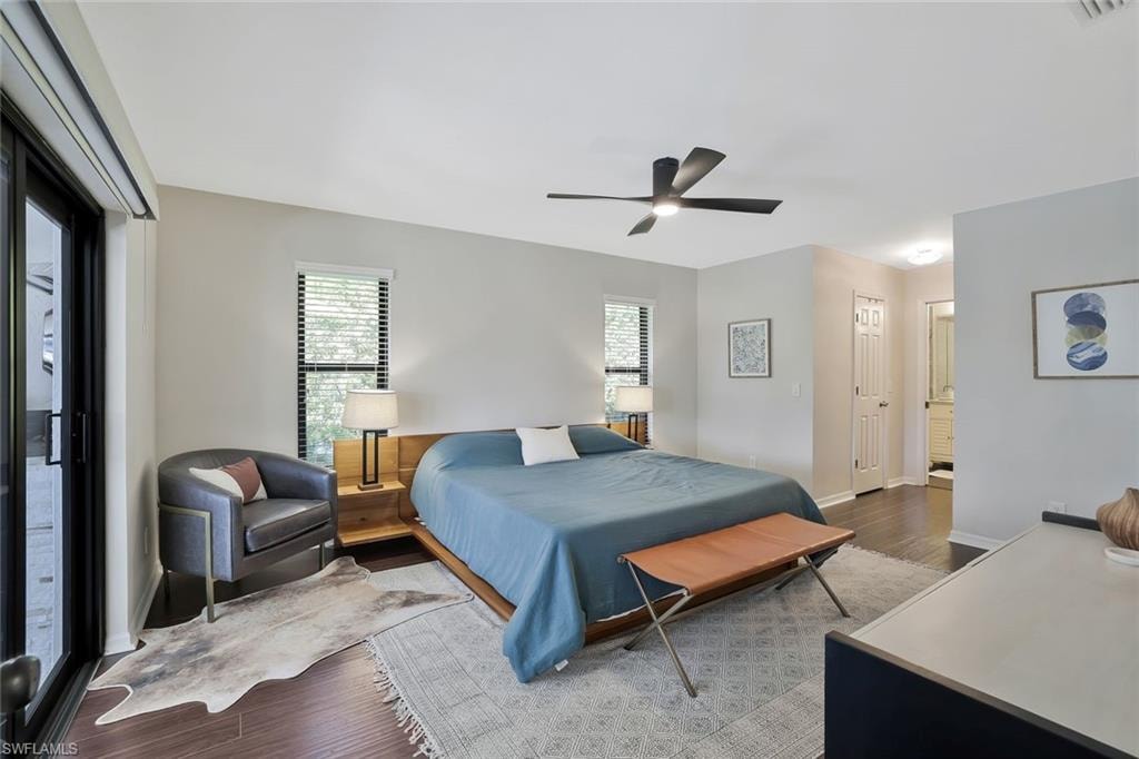 Bedroom with wood finished floors and a ceiling fan