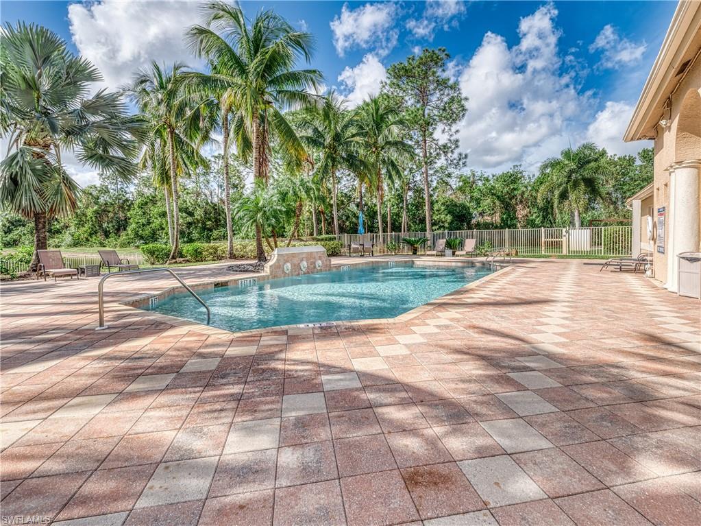Community pool featuring a patio area