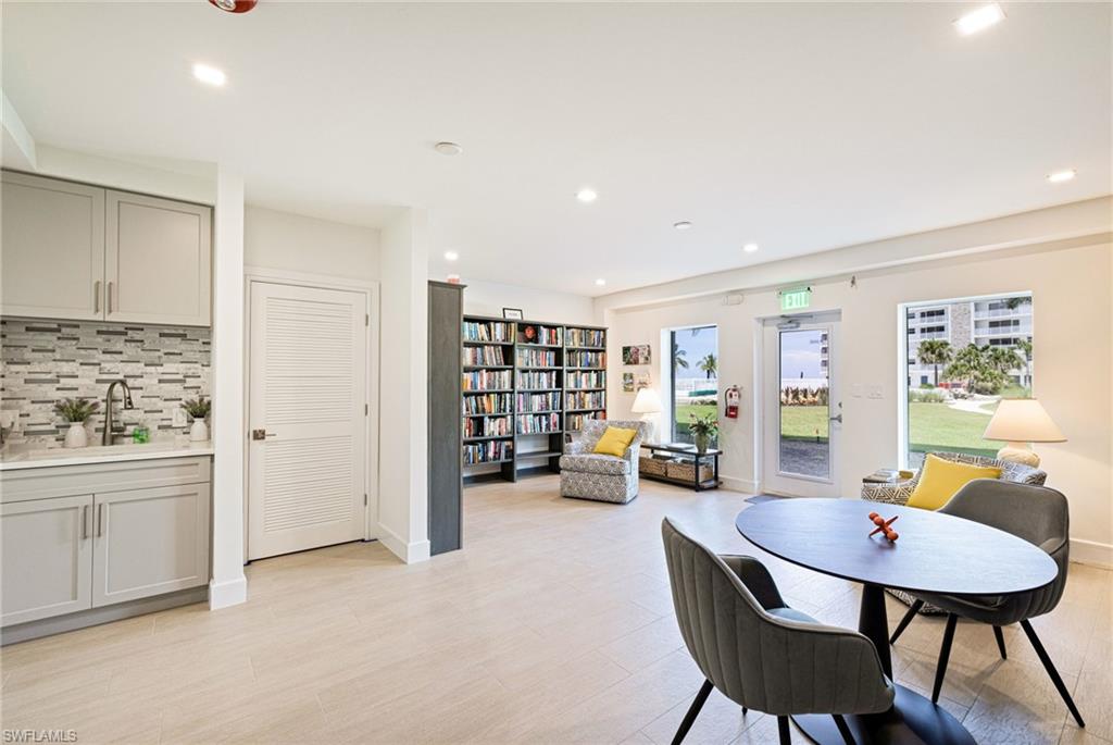 Dining space with recessed lighting and light wood finished floors
