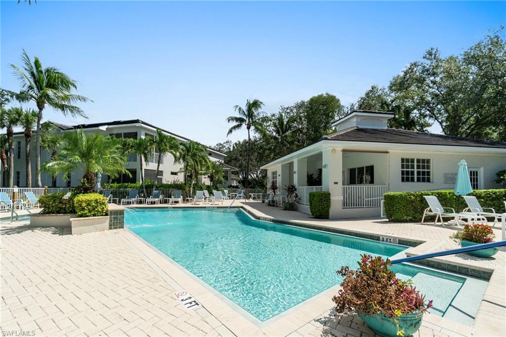 Community pool with a patio area