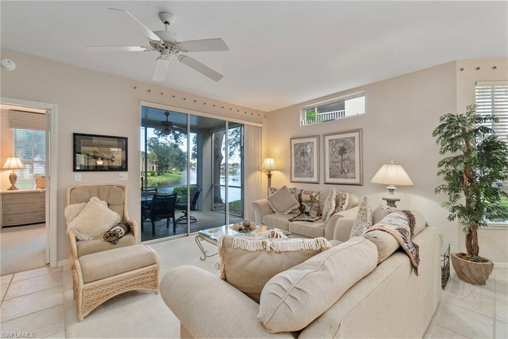 Living area featuring tile patterned flooring and plenty of natural light