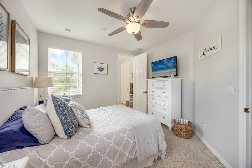 Bedroom featuring carpet flooring and a ceiling fan