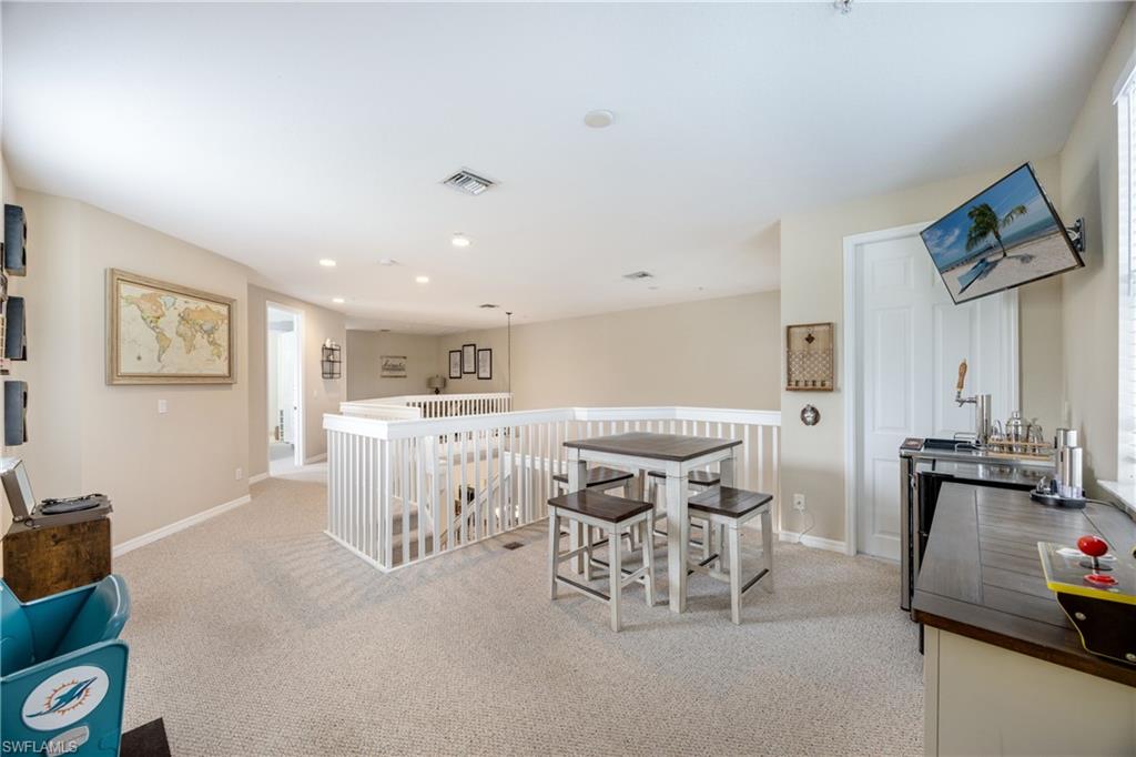 Loft (2 areas)  featuring light carpet and recessed lighting