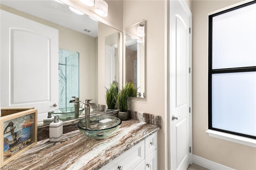 Guest bathroom (2) featuring granite