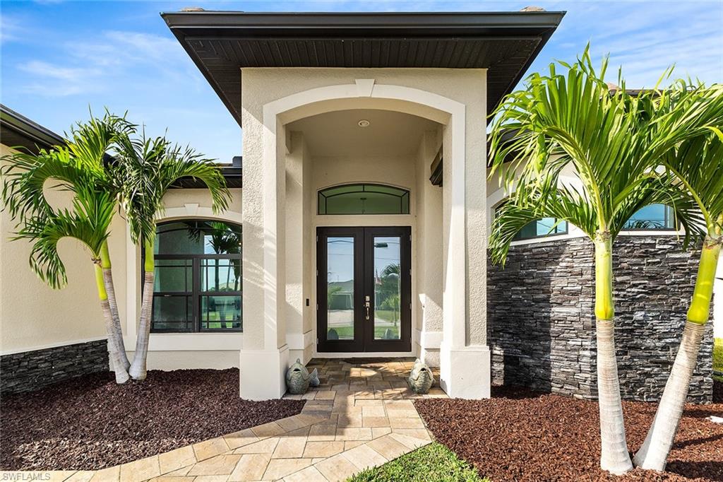 Entrance to property with french doors