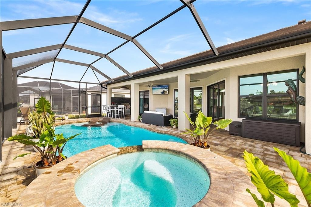 View of custom pool and hot tub