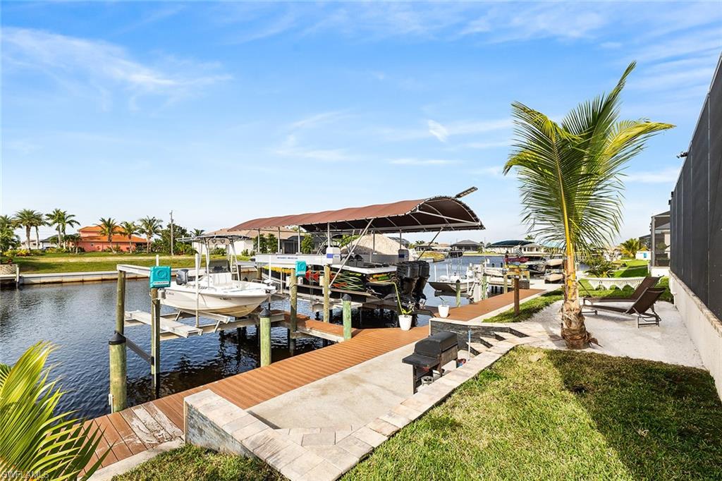 View of composite dock featuring 3 boat lifts