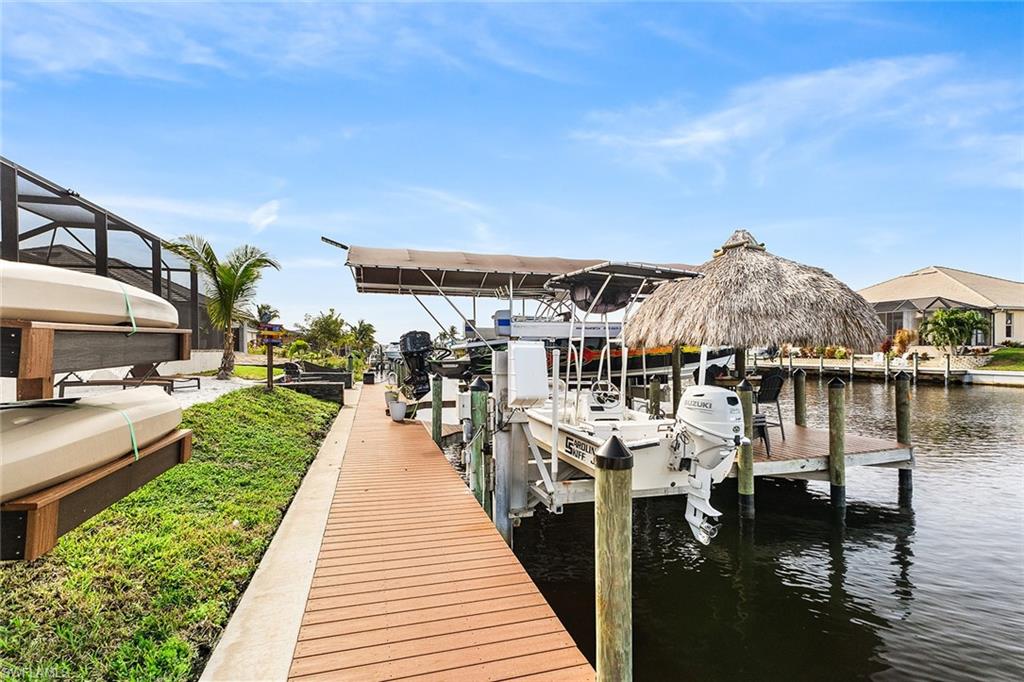 View of composite dock featuring canal view