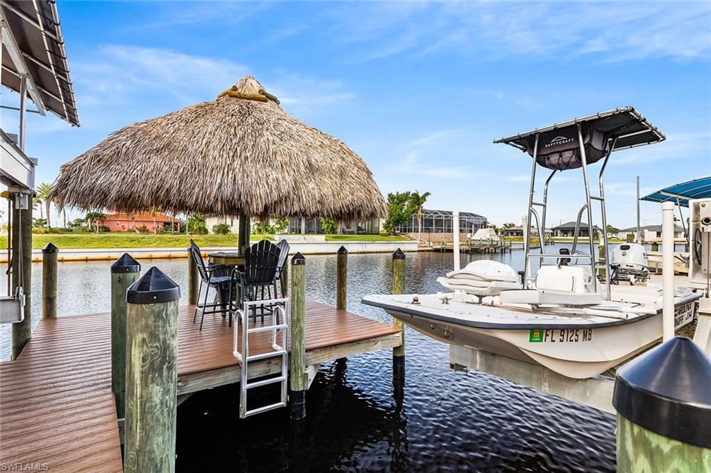 View of dock featuring a canal view